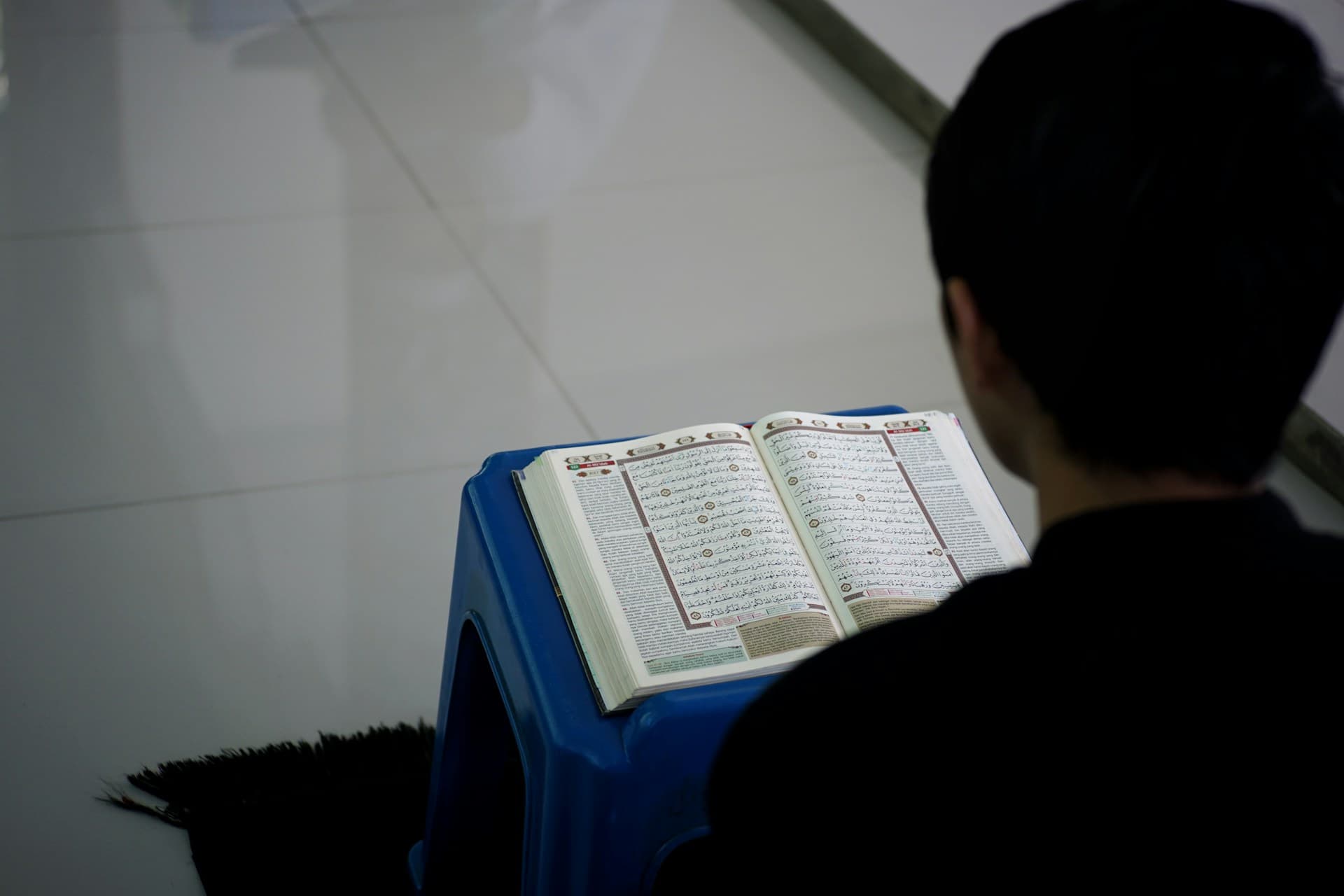 Quran and study materials for memorization practice